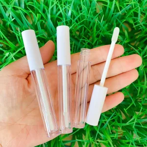 Stock 100pcs Round 2ml Lip Plumper Gloss Empty Tubes White Custom Logo Lip Gloss Tubes With Flat Brush
